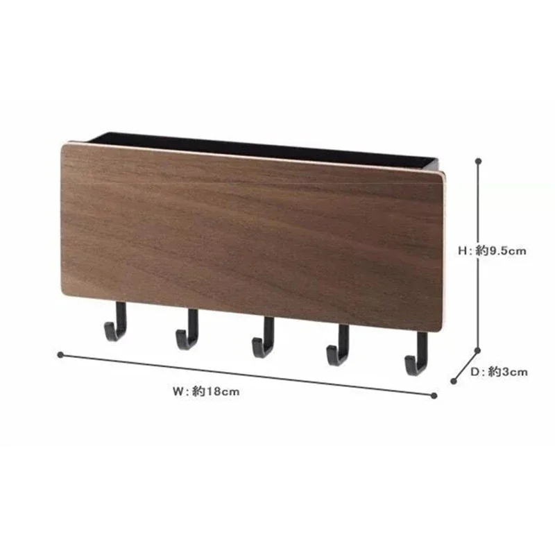 Dimension diagram of the key holder showing 18 cm width, 9.5 cm height and 3 cm depth, with five hooks along the base