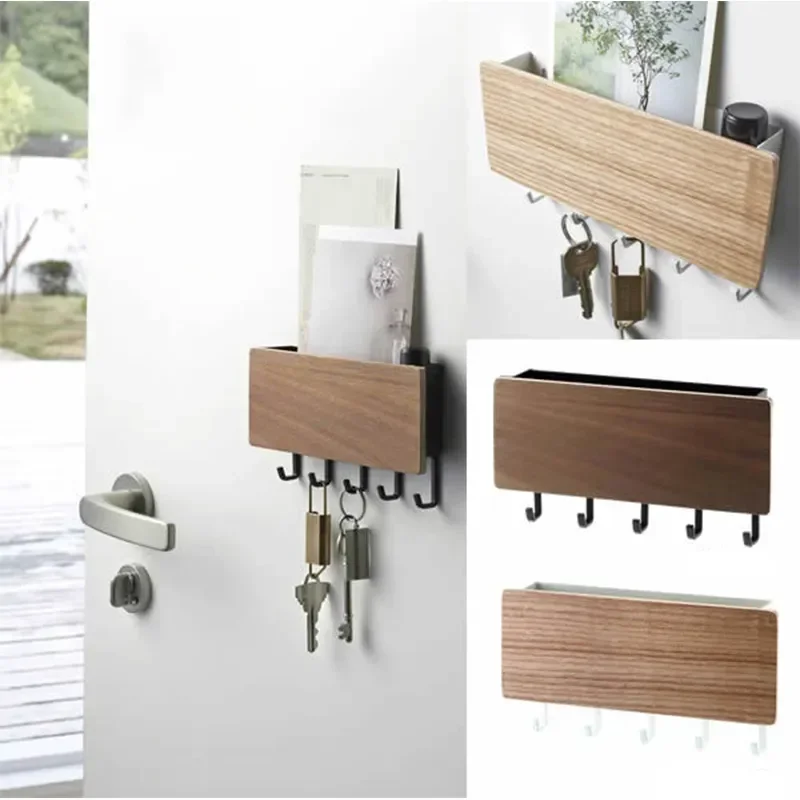 Walnut-look key holder with shelf mounted beside a front door, letters in the tray and keys and padlocks on the five hooks