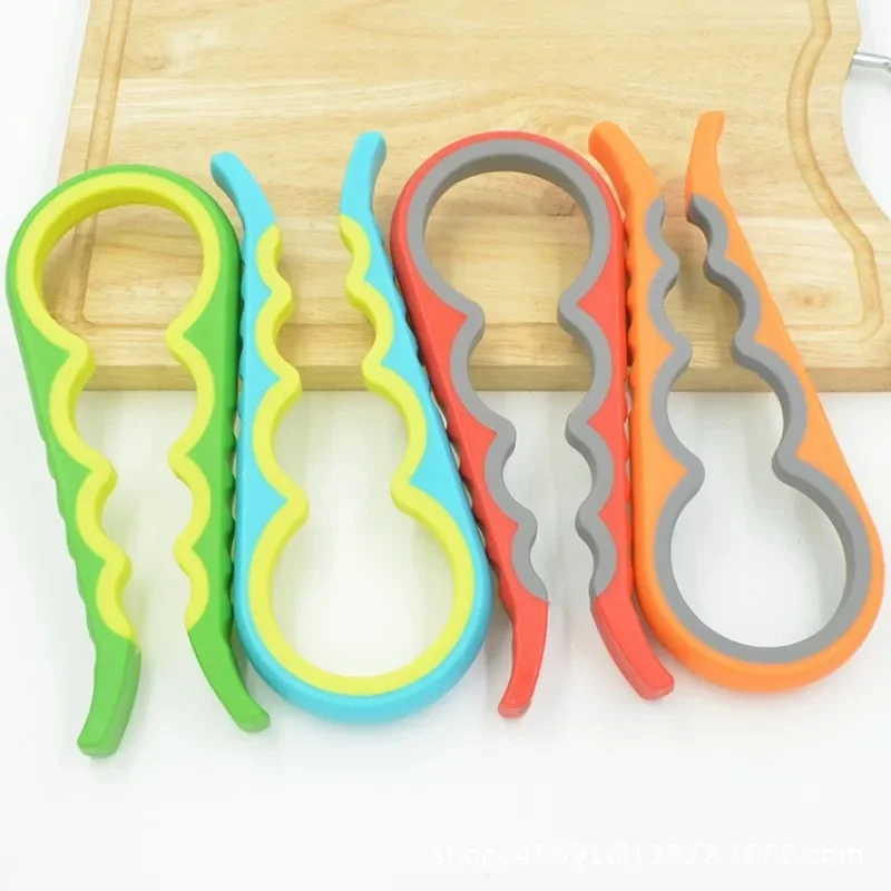 Four colourways of the 4-in-1 jar opener arranged on a wooden chopping board