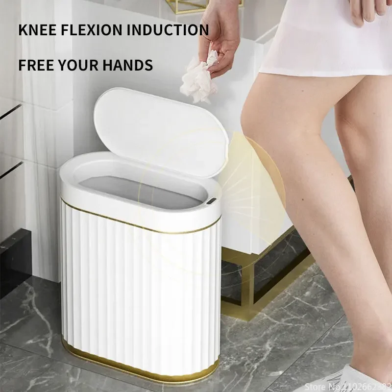 Person opening the sensor bin with a knee while holding a used tissue in one hand, lid hinged fully back